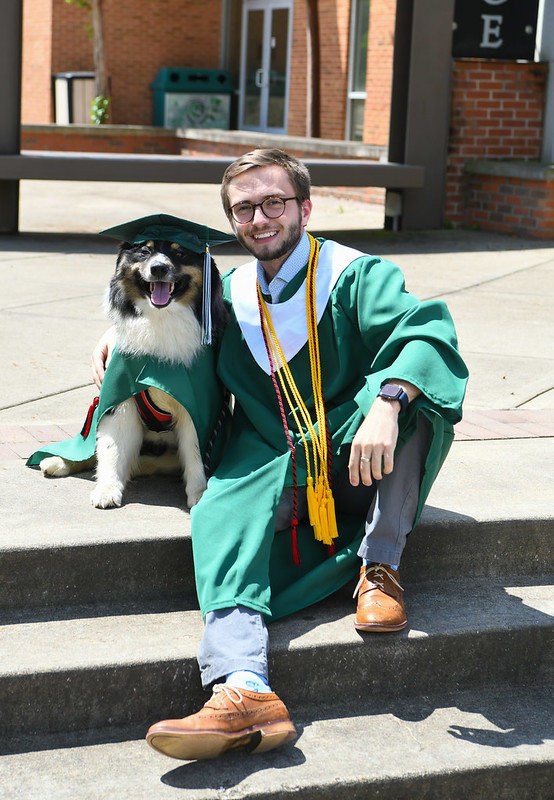 Rob Beard and Stinky in cap and gown