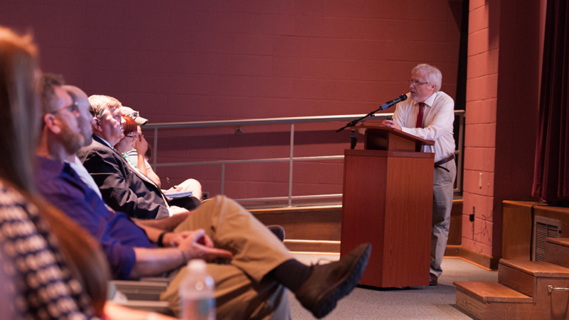 Professor Gidcomb giving lecture