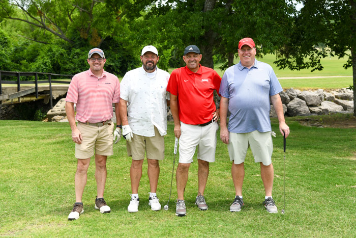 Pictured (left to right): Third flight, first place winners, Daniel Oldham, Robert Oldham, Clarke Oldham and Mark Blackburn. 