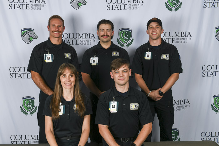 Pictured, front row (left to right): Williamson County paramedic graduates Lana Tolley and Joseph Baugh. Pictured, back row (left to right): Erik Armes, Scott Faver and Miles Dixon. 