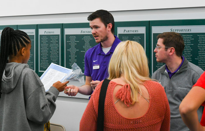 A Tennessee Technological University recruiter speaks to a high school student from Maury County.