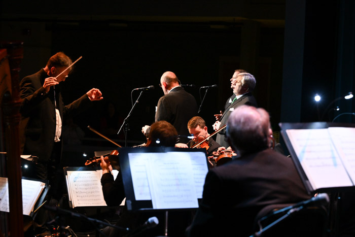 Conductor David Wroe leads an 18-piece orchestra during the Irish Tenors performance at Columbia State’s Cherry Theater. 